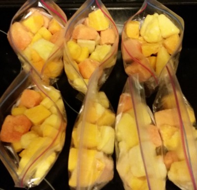 Frozen tropical fruit stored in individual servings.